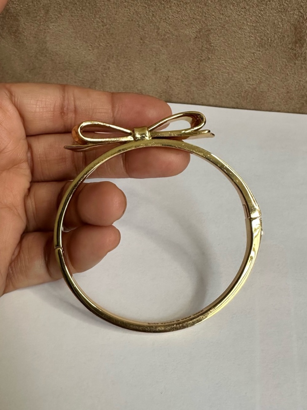 kate spade Gold Bow Bangle Bracelet 2.25” Diameter in Very Good Condition